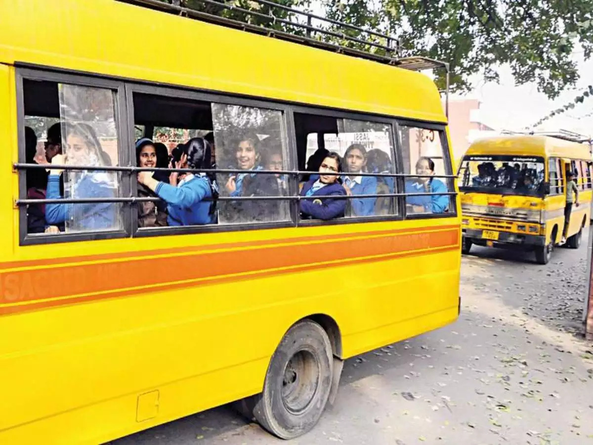 Picture of a yellow school bus with students